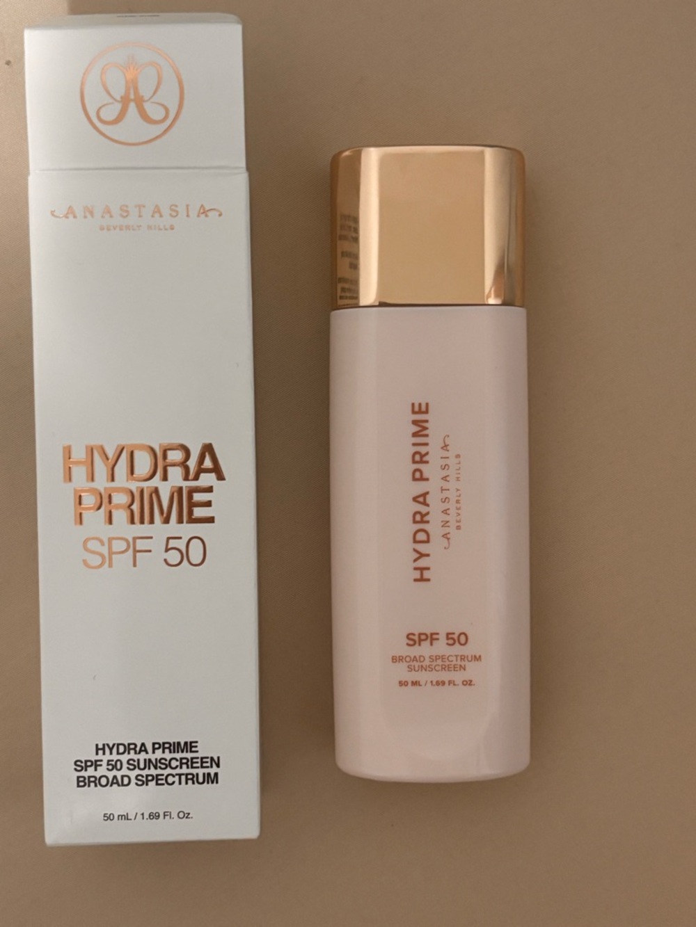 Anastasia Beverly Hills Hydra Prime SPF 50 - Pale Pink & Rose Gold Cap